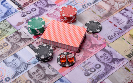 Casino and gambling in Thailand, risk to win or lose money. Betting chips as a background for your designの写真素材