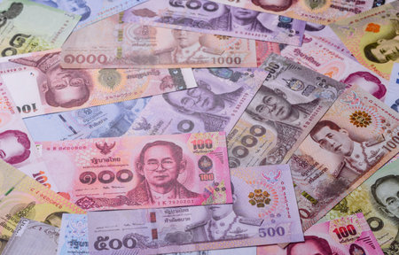 Thailand paper money, dinar banknotes as currency for exchange or travel. Thai money as a business backgroundの写真素材