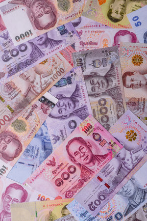 Thailand paper money, dinar banknotes as currency for exchange or travel. Thai money as a business backgroundの写真素材