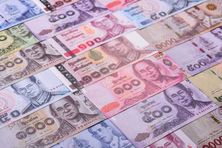 Thailand paper money, dinar banknotes as currency for exchange or travel. Thai money as a business backgroundの写真素材