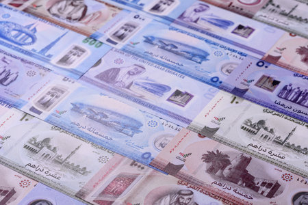 UAE money, dirhams, cash arabic banknotes for financial and business processes. Emirates cash as a...
