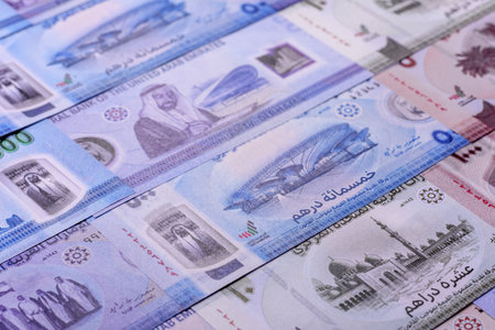UAE money, dirhams, cash arabic banknotes for financial and business processes. Emirates cash as a...