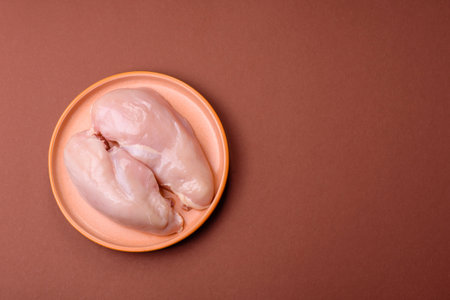 Raw chicken or turkey breast, skinless and boneless. Chicken breast is a high-protein food