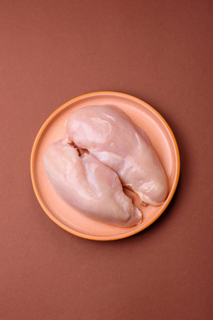Raw chicken or turkey breast, skinless and boneless. Chicken breast is a high-protein foodの写真素材