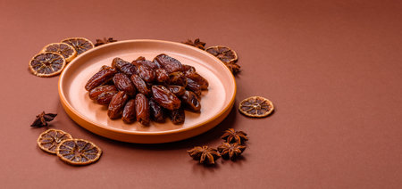 Dried dates in a ceramic plate, arabic food for the ramadan table. Dried dates as a food backdrop...
