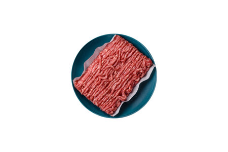 Raw ground beef or pork, prepared meat for burgers or other food preparation. Raw ground beef as a...