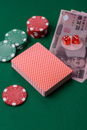 Casino game in the Japan, yen money, chips, cards and other attributes. Gambling in casinos in the...