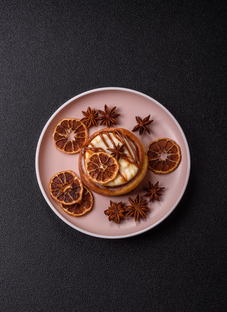 A sweet bun with citrus, cherries, and chocolate, a Danish dessert with cream. This food background...