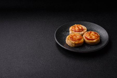 Round fish or chicken cutlets baked with tomato and cheese. Fish cutlets as a backdrop for your...