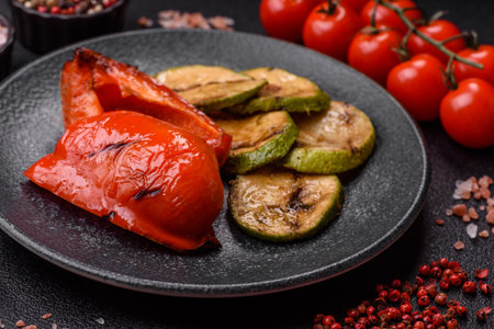 Grilled red bell peppers, vegetarian food. Red bell peppers as a food background for your design.の写真素材