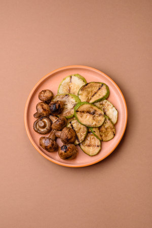 Grilled green zucchini slices, vegetarian food. Green barbecue zucchini as a background for your designの写真素材