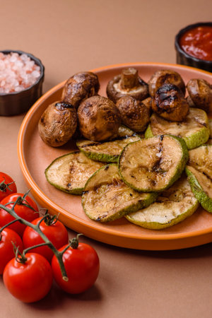 Grilled green zucchini slices, vegetarian food. Green barbecue zucchini as a background for your designの写真素材