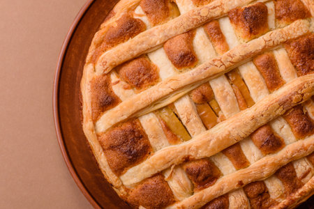 Sweet American pie with apples, pears, and cinnamon, a homemade dessert. Apple American pie as a...