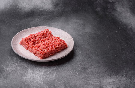 Raw ground beef for a burger or as an ingredient in a meat dish. Raw ground beef as a food...