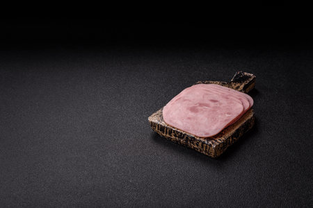 Meat, square ham sliced, organic food, protein for snacks. Sliced ham as a food background for your...