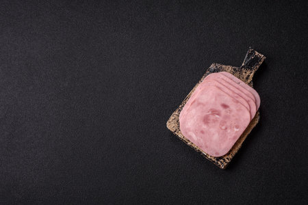 Meat, square ham sliced, organic food, protein for snacks. Sliced ham as a food background for your...