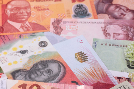 Paper money, banknotes of different countries in several denominations as a business background. Paper money and cash as a financial background for your design.の写真素材