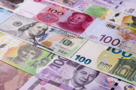 Paper money, banknotes of different countries in several denominations as a business background....