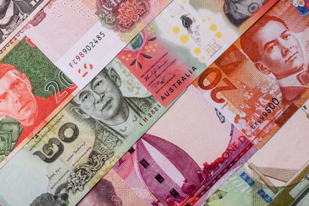 Paper money, banknotes of different countries in several denominations as a business background....