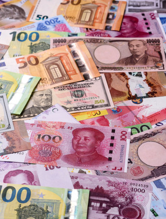 Paper money, banknotes of different countries in several denominations as a business background....