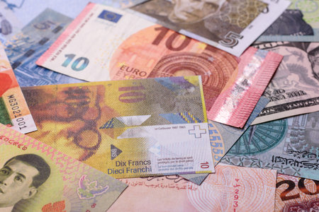 Paper money, banknotes of different countries in several denominations as a business background. Paper money and cash as a financial background for your design.の写真素材