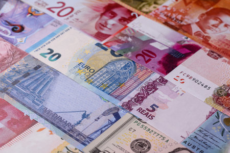 Paper money, banknotes of different countries in several denominations as a business background....