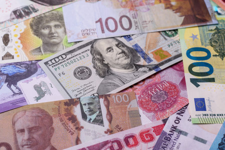 Paper money, banknotes of different countries in several denominations as a business background. Paper money and cash as a financial background for your design.の写真素材