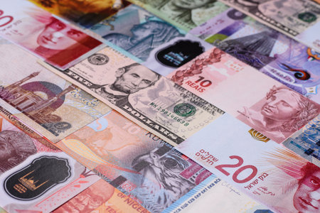 Paper money, banknotes of different countries in several denominations as a business background....