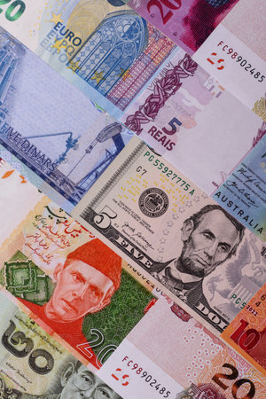 Paper money, banknotes of different countries in several denominations as a business background....