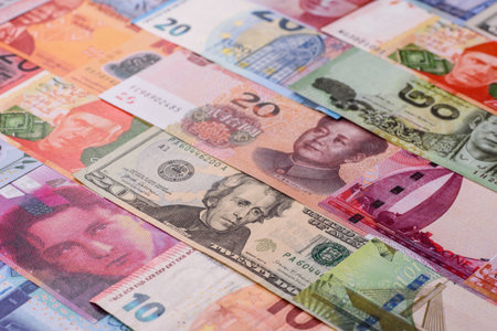 Paper money, banknotes of different countries in several denominations as a business background....
