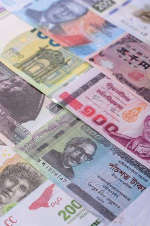 Paper money, banknotes of different countries in several denominations as a business background....