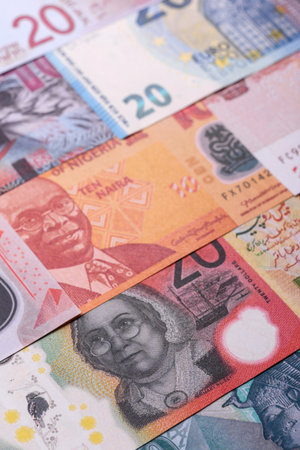 Paper money, banknotes of different countries in several denominations as a business background. Paper money and cash as a financial background for your design.の写真素材