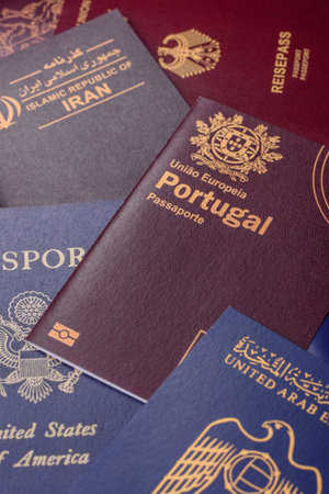 A background of several passports from different countries, an international ID card. Passports from different countries as a background for your designの写真素材