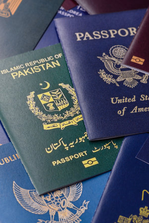 A background of several passports from different countries, an international ID card. Passports from different countries as a background for your designの写真素材