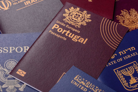 A background of several passports from different countries, an international ID card. Passports from different countries as a background for your designの写真素材