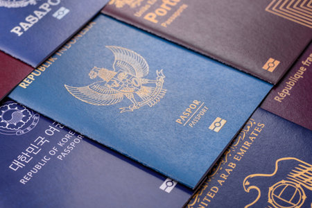 A background of several passports from different countries, an international ID card. Passports from different countries as a background for your designの写真素材