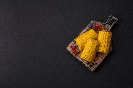 Corn cob cooked in chunks, vegetables, healthy vegetarian food. Boiled corn as a food background for your designの写真素材