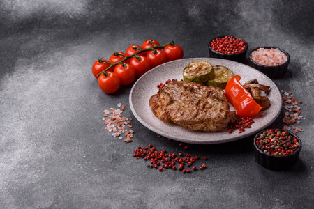 Grilled beef or pork steak, healthy restaurant food for lunch. Barbecue steak as a food background for your designの写真素材