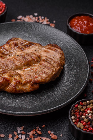 Grilled beef or pork steak, healthy restaurant food for lunch. Barbecue steak as a food background for your designの写真素材