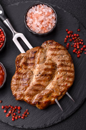 Grilled beef or pork steak, healthy restaurant food for lunch. Barbecue steak as a food background for your designの写真素材