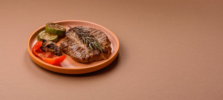 Grilled beef or pork steak, healthy restaurant food for lunch. Barbecue steak as a food background for your designの写真素材