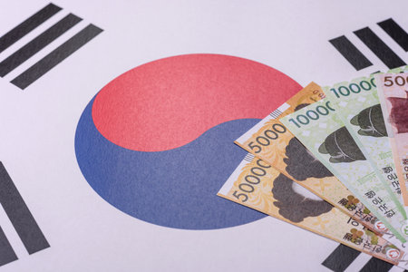 Korean paper money, won, and cash banknotes for financial and business transactions. Korean money as a background for your designの写真素材
