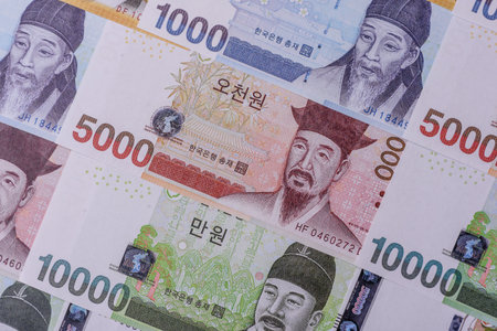Korean paper money, won, and cash banknotes for financial and business transactions. Korean money as a background for your designの写真素材