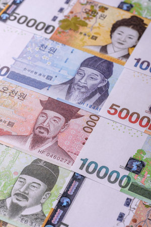Korean paper money, won, and cash banknotes for financial and business transactions. Korean money as a background for your designの写真素材