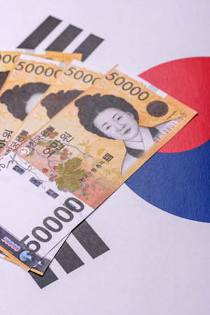 Korean paper money, won, and cash banknotes for financial and business transactions. Korean money as a background for your designの写真素材