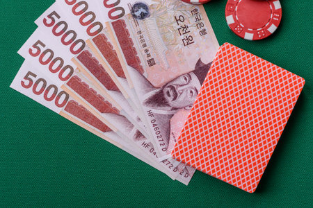 Casino game with won money, chips, cards and other attributes. Gambling in casinos as a background...