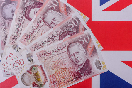 Britain paper money, pound sterling, cash banknotes for financial and business transactions. Britain money as a background for your designの写真素材