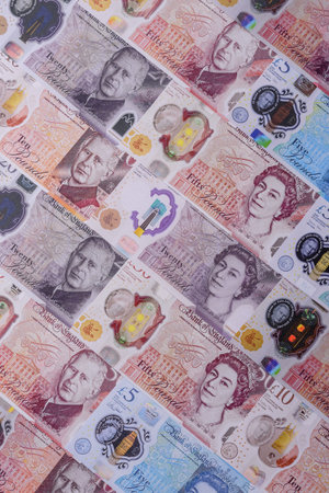 Britain paper money, pound sterling, cash banknotes for financial and business transactions. Britain money as a background for your designの写真素材
