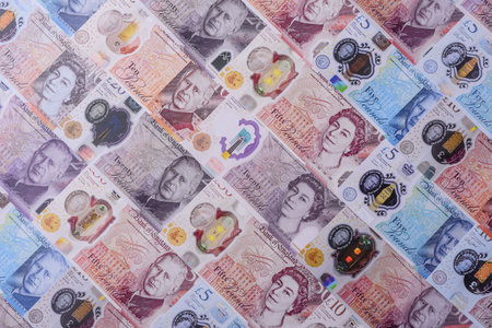Britain paper money, pound sterling, cash banknotes for financial and business transactions. Britain money as a background for your designの写真素材