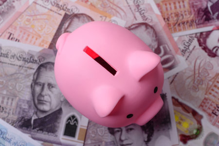 Britain paper money, pound sterling, cash banknotes for financial and business transactions. Britain money as a background for your designの写真素材